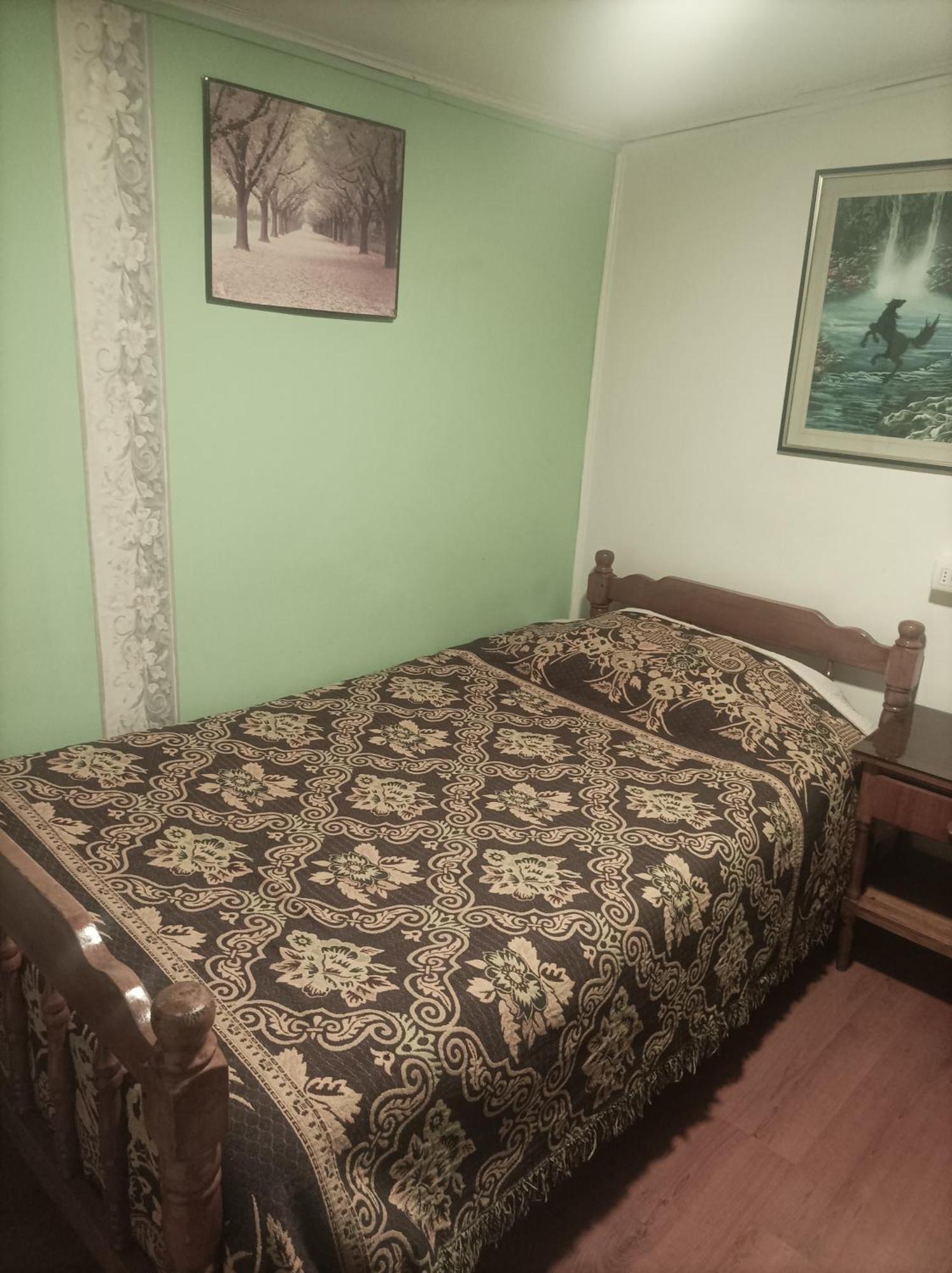Alojamiento Familiar Rey Bed & Breakfast Punta Arenas Bagian luar foto