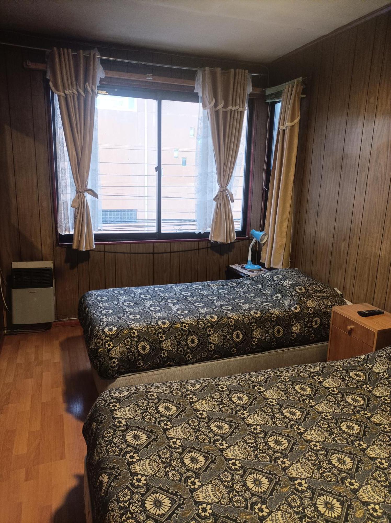 Alojamiento Familiar Rey Bed & Breakfast Punta Arenas Bagian luar foto